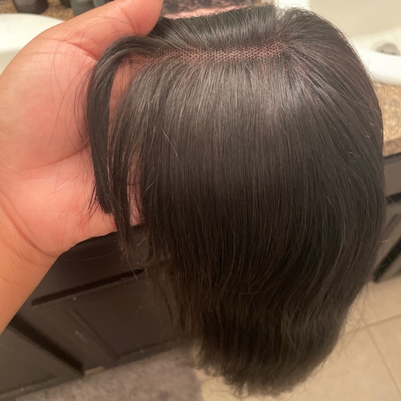 This is a 100% human hair wig 16 in long with bangs. From Luvme Hair. Brand new!